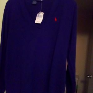 A Ralph Lauren Polo sweater with original tags